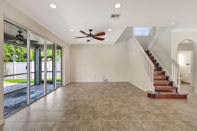 unfurnished living room featuring ceiling fan, recessed lighting, baseboards, visible vents, and ornamental molding