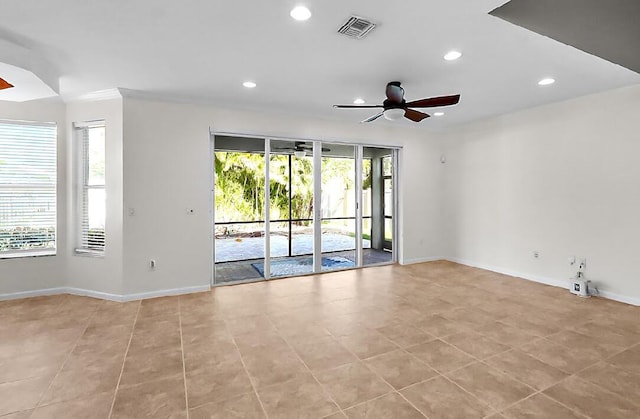 unfurnished room featuring light tile patterned flooring, ceiling fan, recessed lighting, baseboards, and visible vents