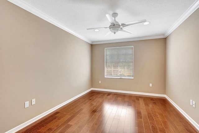 empty room with baseboards, a ceiling fan, recessed lighting, and hardwood / wood-style flooring