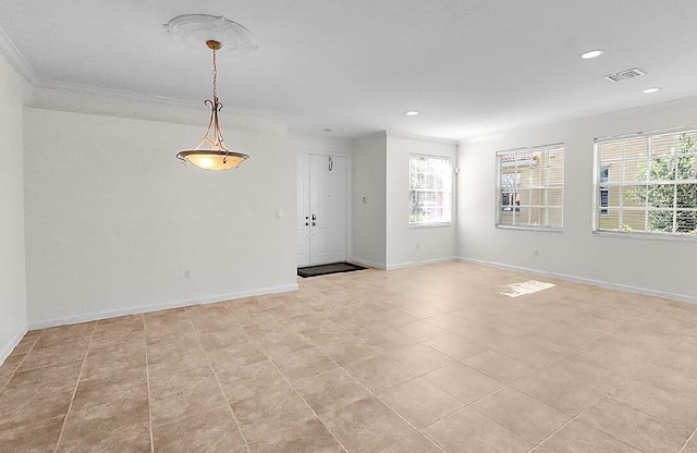 unfurnished room featuring baseboards, recessed lighting, and visible vents