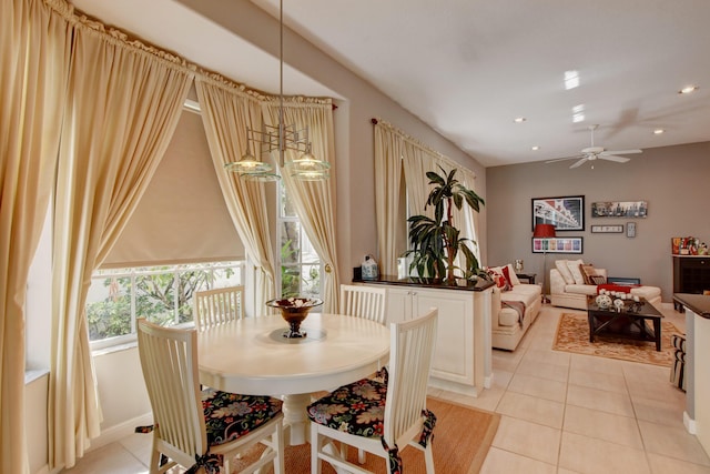 dining room with light tile patterned floors, baseboards, recessed lighting, and a ceiling fan