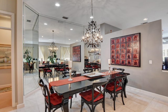 dining room with a chandelier, visible vents, and recessed lighting