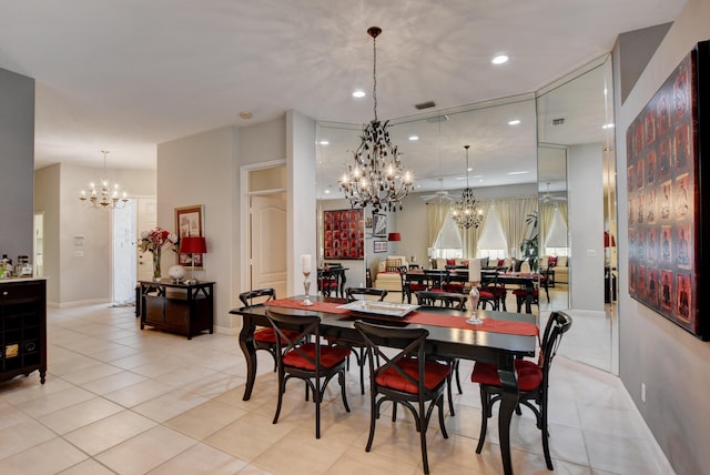 dining space featuring light tile patterned floors, visible vents, a chandelier, and recessed lighting