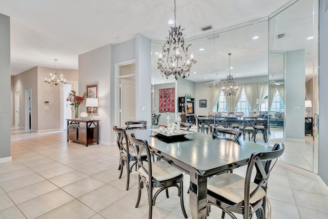 dining room with a notable chandelier, recessed lighting, light tile patterned floors, baseboards, and visible vents