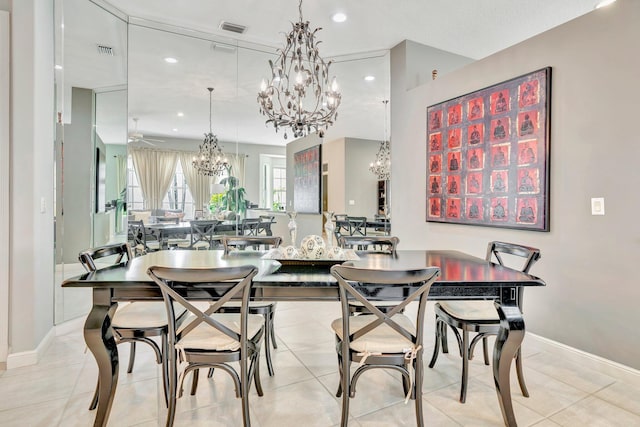 dining room with a notable chandelier, visible vents, and recessed lighting