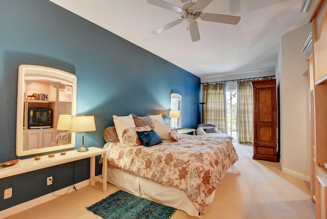 carpeted bedroom featuring ceiling fan, access to outside, and baseboards