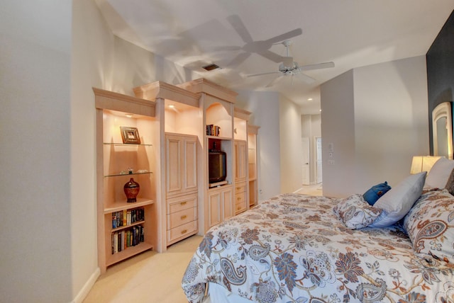 bedroom with a ceiling fan, visible vents, and light colored carpet