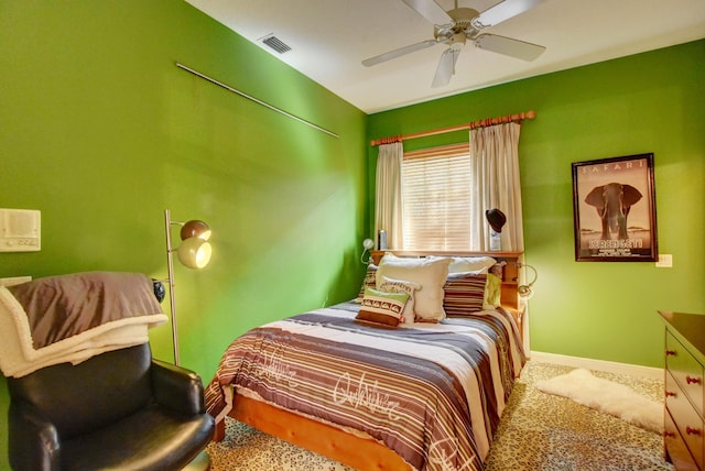 bedroom featuring ceiling fan, carpet, baseboards, and visible vents
