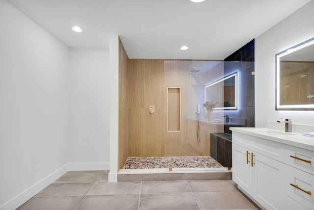 2795 Hawthorne Ln, West Palm Beach, FL 33409 - full bathroom with a tile shower, vanity, recessed lighting, baseboards, and tile patterned floors