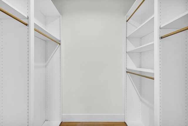 2795 Hawthorne Ln, West Palm Beach, FL 33409 - walk in closet with wood finished floors
