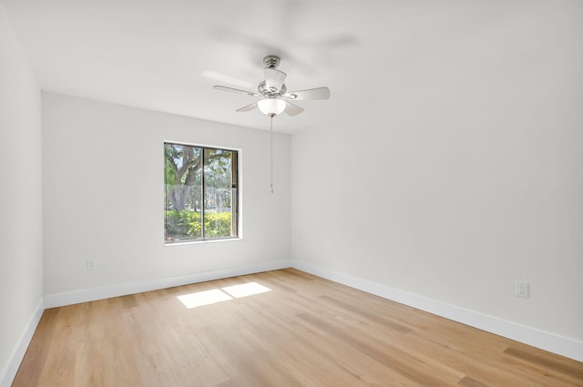 2795 Hawthorne Ln, West Palm Beach, FL 33409 - spare room featuring light wood-style flooring, baseboards, and a ceiling fan