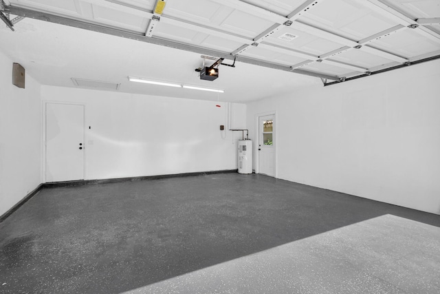 2795 Hawthorne Ln, West Palm Beach, FL 33409 - garage featuring water heater and a garage door opener