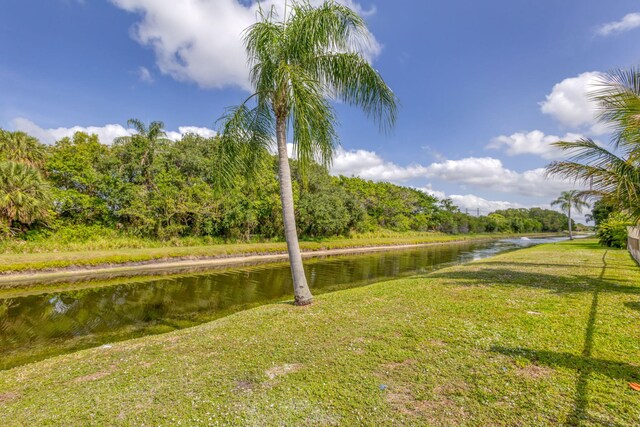 2795 Hawthorne Ln, West Palm Beach, FL 33409 - view of grassy yard featuring a water view