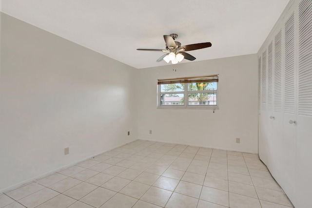 empty room with a ceiling fan