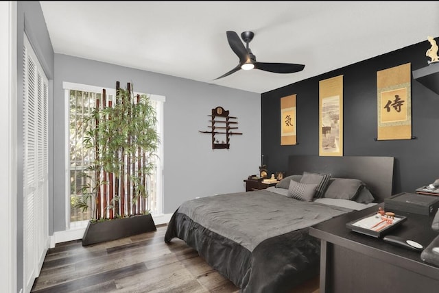 7 Via Tivoli, Palm Beach Gardens, FL 33418 - bedroom with ceiling fan and wood finished floors