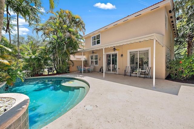 4474 Thornwood Cir, Palm Beach Gardens, FL 33418 - swimming pool with ceiling fan, a patio, and fence