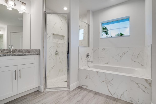 1222 SW Albenga Ave, Port Saint Lucie, FL 34953 - full bath featuring a marble finish shower, vanity, and a bath