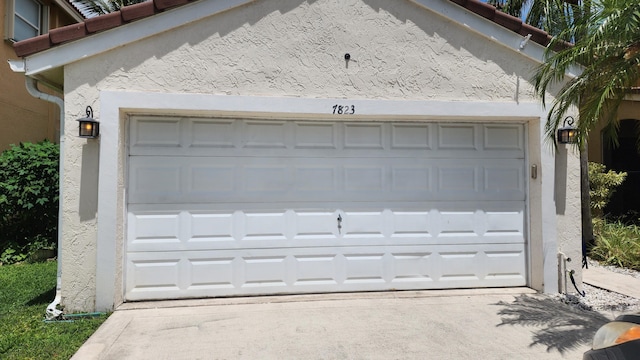 garage with driveway