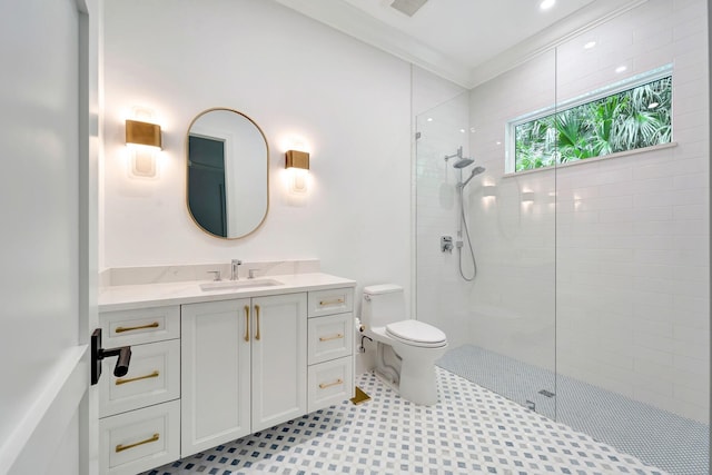 full bathroom with toilet, walk in shower, and vanity