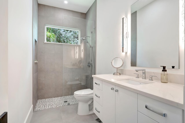 full bathroom with a walk in shower, tile patterned floors, vanity, and toilet