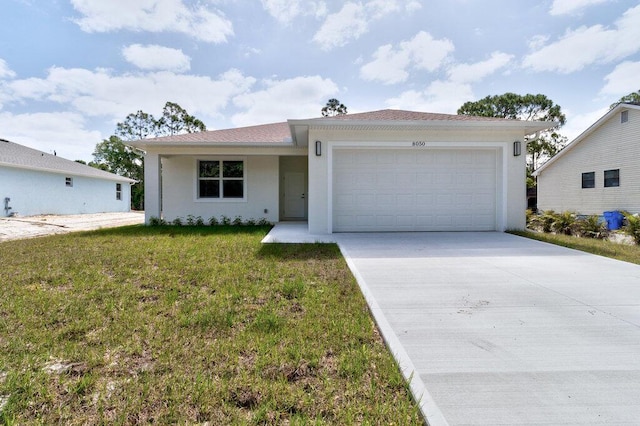 ranch-style home with stucco siding, driveway, a front lawn, and a garage