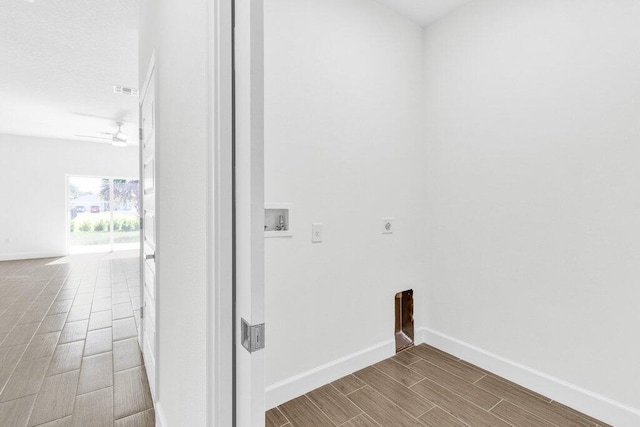 washroom with laundry area, baseboards, wood tiled floor, washer hookup, and hookup for an electric dryer
