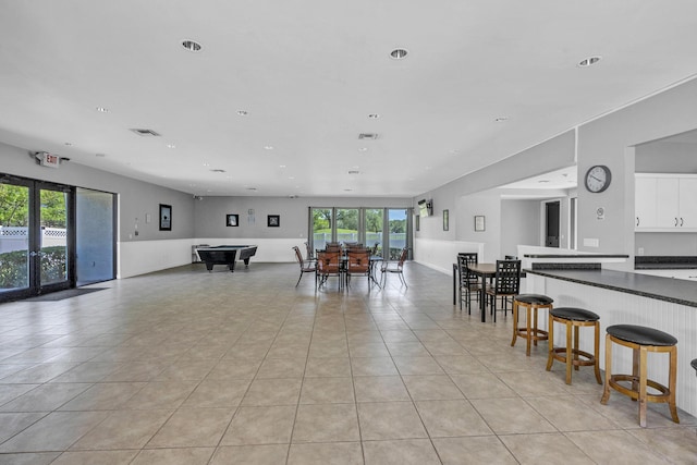 dining area featuring french doors, recessed lighting, pool table, and light tile patterned floors