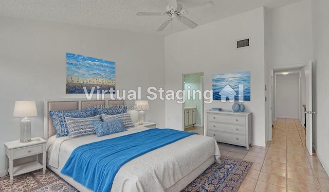 tiled bedroom with visible vents, baseboards, high vaulted ceiling, a textured ceiling, and a ceiling fan