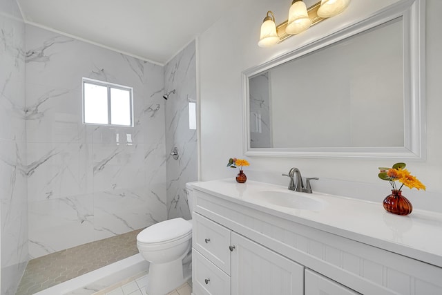 full bathroom with vanity, toilet, and a marble finish shower