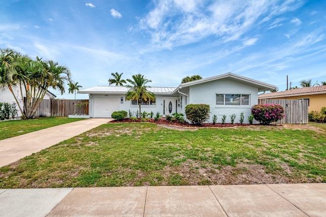 1065 SW 13th St, Boca Raton, FL 33486 - ranch-style house with driveway, fence, a front lawn, an attached garage, and stucco siding
