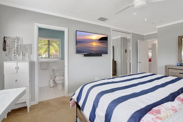 1065 SW 13th St, Boca Raton, FL 33486 - bedroom featuring ceiling fan, visible vents, crown molding, carpet floors, and ensuite bathroom