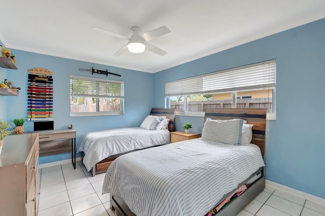 1065 SW 13th St, Boca Raton, FL 33486 - bedroom featuring crown molding, a ceiling fan, baseboards, and light tile patterned flooring