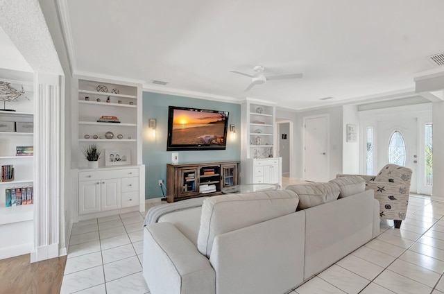 1065 SW 13th St, Boca Raton, FL 33486 - living area with a ceiling fan, visible vents, built in shelves, baseboards, and ornamental molding