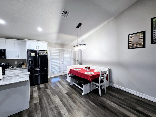 603 NW 11th Ave, Okeechobee, FL 34972 - dining room with recessed lighting, baseboards, dark wood-style floors, and visible vents