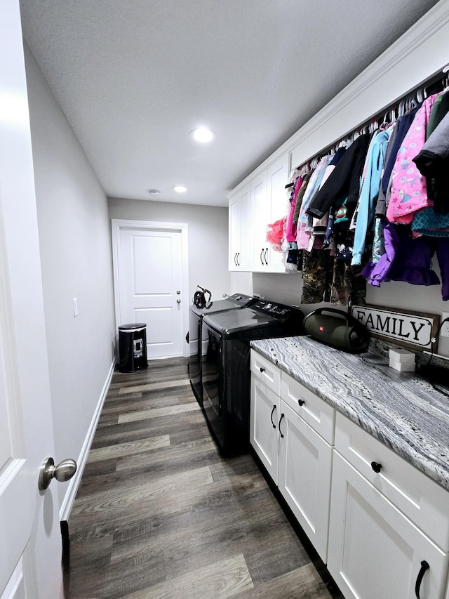 603 NW 11th Ave, Okeechobee, FL 34972 - clothes washing area with baseboards, recessed lighting, dark wood-type flooring, separate washer and dryer, and cabinet space