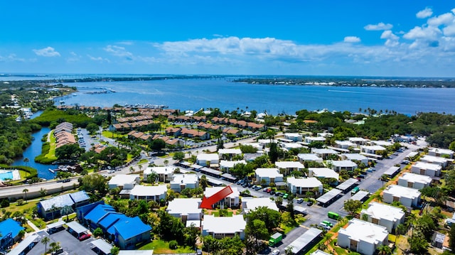 1501 NE 13th Ter Unit H-9, Jensen Beach, FL 34957 - birds eye view of property featuring a water view and a residential view