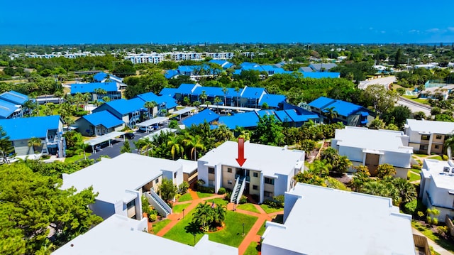 1501 NE 13th Ter Unit H-9, Jensen Beach, FL 34957 - drone / aerial view featuring a residential view
