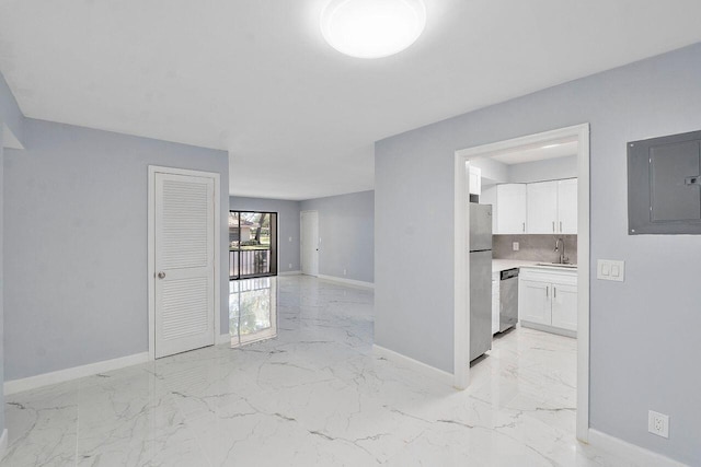 9960 Pineapple Tree Dr Unit 107, Boynton Beach, FL 33436 - interior space with a sink, baseboards, electric panel, and marble finish floor