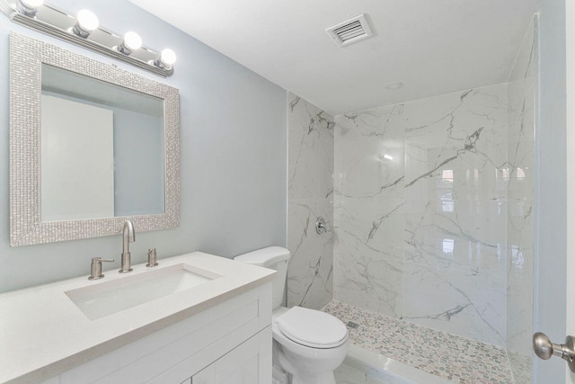 9960 Pineapple Tree Dr Unit 107, Boynton Beach, FL 33436 - full bath featuring a marble finish shower, vanity, toilet, and visible vents