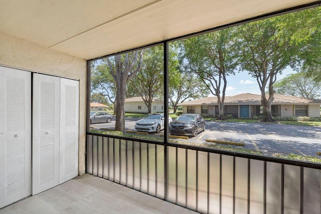 9960 Pineapple Tree Dr Unit 107, Boynton Beach, FL 33436 - sunroom featuring a residential view