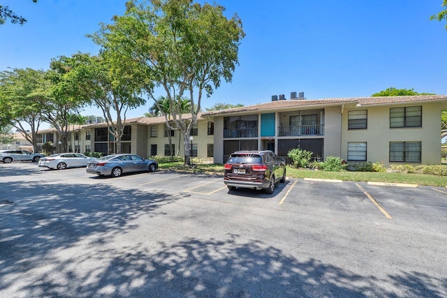 9960 Pineapple Tree Dr Unit 107, Boynton Beach, FL 33436 - view of property with uncovered parking