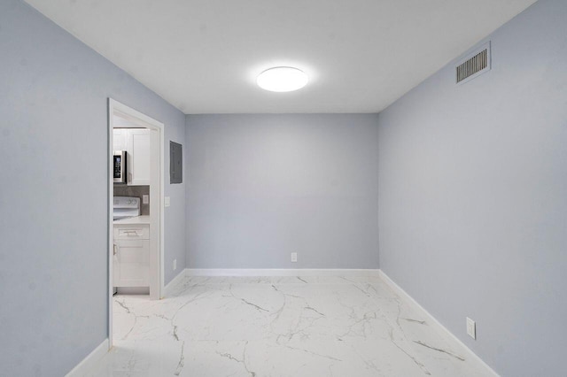 9960 Pineapple Tree Dr Unit 107, Boynton Beach, FL 33436 - spare room with baseboards, visible vents, marble finish floor, and electric panel