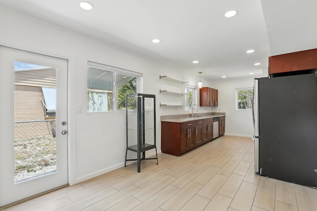 kitchen featuring open shelves, baseboards, recessed lighting, a sink, and stainless steel appliances