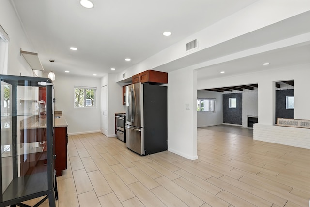 kitchen with visible vents, recessed lighting, baseboards, and appliances with stainless steel finishes