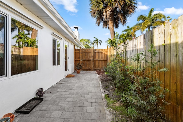 view of yard with a fenced backyard, a patio area, and visible vents