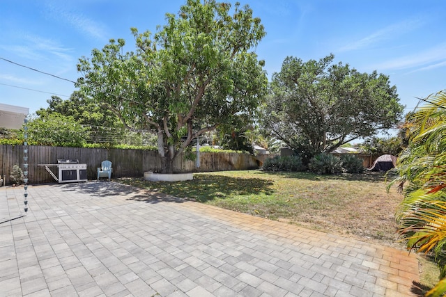 view of patio featuring a fenced backyard