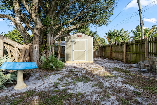 view of shed featuring a fenced backyard