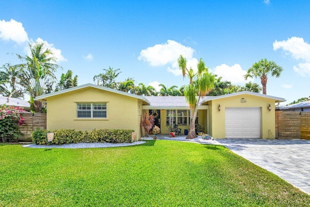 2701 SW 4th St, Boynton Beach, FL 33435 - single story home with a garage, fence, stucco siding, and decorative driveway