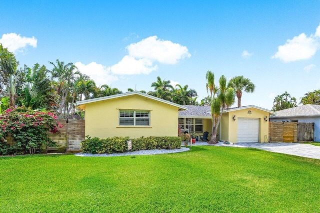 2701 SW 4th St, Boynton Beach, FL 33435 - single story home with a garage, stucco siding, driveway, and fence