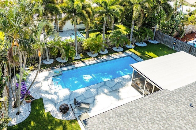 2701 SW 4th St, Boynton Beach, FL 33435 - view of swimming pool featuring a fenced in pool, a fenced backyard, and a patio